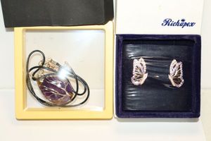 lot 101 image: Jewelry purple stone wrapped in gold wire and purple stone butterfly earrings