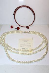 lot 106 image: Jewelry Jackie collection pearl necklace marked FM China (Franklin Mint) plus red bead necklace and earrings
