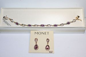 lot 107 image: Jewelry Purple and crystal bracelet and earrings (bracelet marked PAJ BB China)