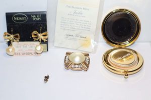 lot 108 image: Jewelry Gold tone and pearl jewelry plus Estee Lauder compact