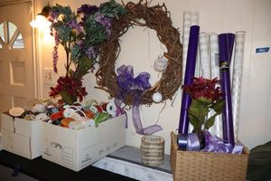 lot 166 image: Wreath, flowers and lots of ribbon