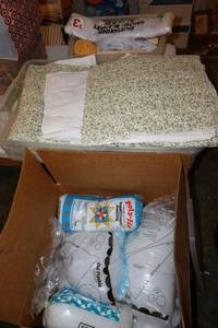 lot 217 image: Poly-fil, fabric, and craft supplies