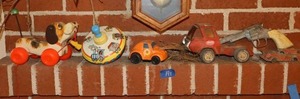 lot 191 image: Vintage metal Tonka truck, spinning top, wooden dog and more