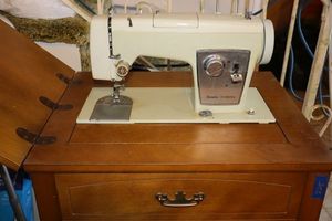 lot 225 image: Sears Kenmore sewing machine with table