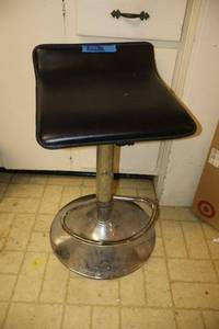 lot 234 image: Black seated stool