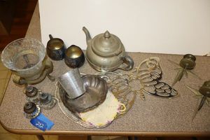 lot 242 image: Vintage door knobs, silver plate items and teapot