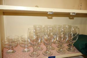 lot 244 image: TURKEY COLONY Clear goblets and dessert bowls with green tablecloth