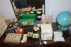lot 313 image: Vintage desk globe, metal and glass Spring ornaments, doll slippers and more