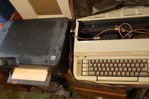 lot 181 image: Vintage Smith-Corona typewriter, and HP Deskjet 3520 printer