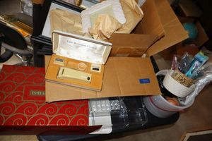 lot 340 image: Estee Lauder organizing tray, photo frames, and Misc.