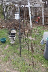 lot 366 image: Metal plant stand, shepherd hooks and plant pots