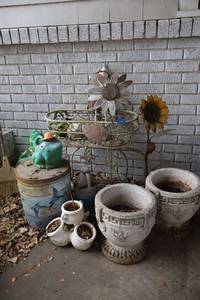 lot 378 image: Cement planters, metal garden art, and plastic frog watering can