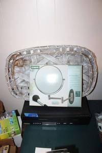 lot 209 image: Wall mount mirror, basket trays, and VCRDVD players