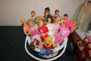 lot 207 image: Barbie and Ken dolls