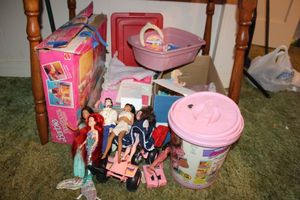lot 200 image: Barbie and Ken toys, Pink Legos, and Barbie furniture