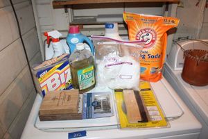 lot 205 image: Laundry and household cleaners with small tools