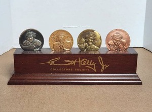 lot 22 image: Vintage Emmett Kelly Jr Flambro medallion collection and display