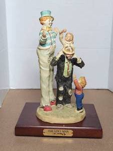 lot 96 image: Vintage Emmett Kelly Jr Flambro Porcelain Clown Figurine - The Stilt Man- wood base - hand signed
