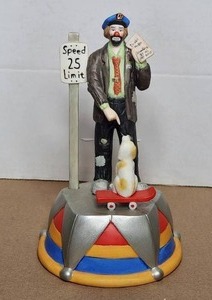 lot 140 image: Vintage Emmett Kelly Jr Flambro Porcelain Clown Music box - Policeman and dog - hand signed