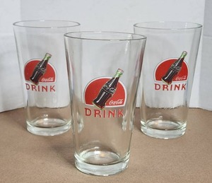 lot 31 image: Selection of vintage collectible coke glasses