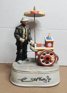 lot 148 image: Vintage Emmett Kelly Jr Flambro Porcelain Clown Figurine - Weary Willie - Hotdog cart - Music Box - signed and dated