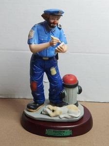 lot 128 image: Vintage Emmett Kelly Jr Flambro Porcelain Clown Figurine - Weary Willie - Policeman - wood stand - signed and dated