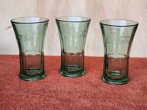 lot 159 image: Selection of 8 vintage collectible Coke glasses - different styles