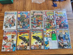 lot 191 image: Selection of vintage comics - Marvel & DC - Secret Origins, Swamp Thing, Super-Heroes Super Girl, Secret Wars, X-Force, Suicide Swuad