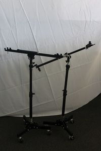 lot 9 image: Two Adjustable Rolling Boom Stands, As Shown In Photos