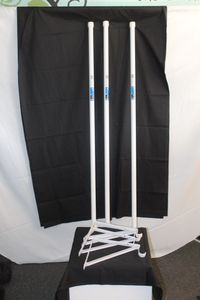 lot 18 image: Three clothing poles and brackets