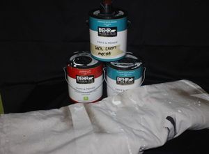 lot 22 image: Household paint, partial cans, with drop cloth