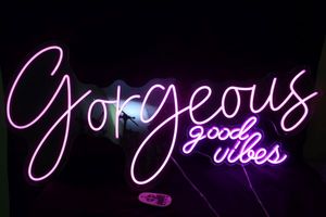 lot 24 image: Two LED Signs, Gorgeous has remote with multiple settings