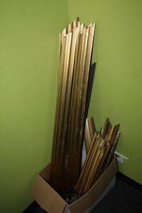 lot 25 image: Box full of Gold Colored Frame PartsTrim Pieces