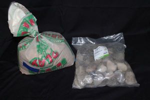 lot 26 image: Partial bag of Sand and bag of Natural Outdoors Rocks