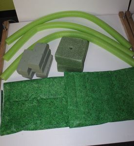 lot 45 image: Floral Decorating Supplies, 3-green pool noodles, wet floral bricks, and dry floral bricks