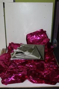 lot 63 image: Bright Pink Mylar and one Siver Piece