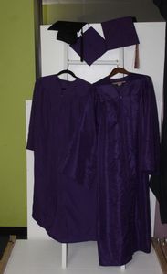lot 77 image: Two Purple Graduation Gowns with Caps
