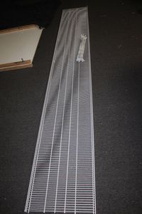 lot 91 image: long White Wire Shelf with brackets, approx. 12 long