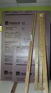 lot 106 image: Foam board and Wood, 2 4x8 and 2 4x4 sheets of Foam insulation Board and Lengths of 1x4 wood as shown