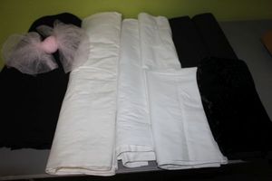 lot 107 image: Several Backdrops, Variety of widths and length, Black velvet for photos and Pink Tulle
