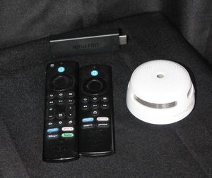 lot 120 image: Smoke Detector and roku streaming device with remotes