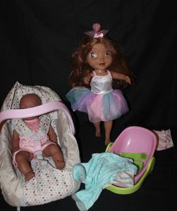 lot 145 image: Baby dolls an accessories
