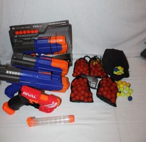 lot 148 image: Toy Guns with lots of refills