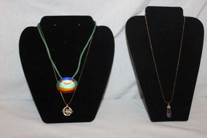 lot 167 image: Jewelry Three Necklaces, Amethyst Teardrop Pendant,Multi Colored Pendant, and Sivler and Gold Cupid