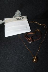 lot 169 image: Gold toned Necklace and and bracelet