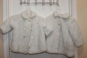 lot 264 image: Two Little Girls White Faux Fur Coats