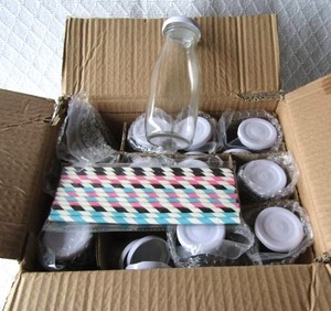 lot 519 image: The Good Ole Milk bottles by Wilden and drinking straws