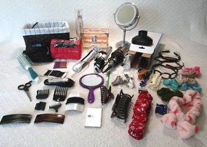 lot 523 image: Assorted personal care items including, curling irons, mirrors, trimmer plus