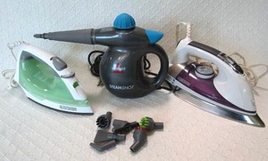 lot 544 image: Black & Decker steam irons and Bissel Steamshot cleaner