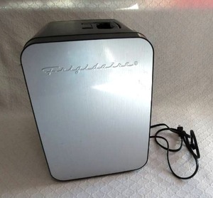 lot 555 image: Frigidaire Portable 10L, 15-can Mini Fridge Brushed Stainless Refrigerator, model EFMIS183-SS. Yes it does work